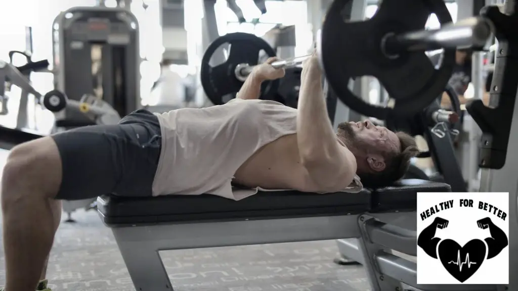 guy in t shirt benching